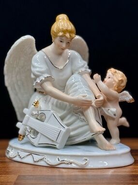 Angel sitting with Harp and Cherub Figurine
